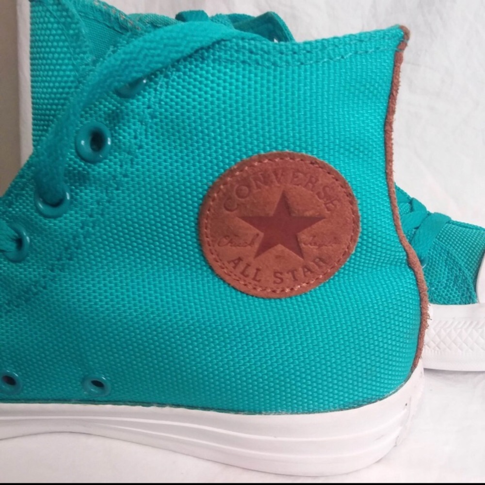 Converse All Star Chuck Taylor High Tops Shoes.